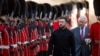 Ukrainian President Volodymyr Zelenskyy (left) and Britain's King Charles inspect a guard of honor at Windsor Castleon October 24.