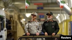 Video released by Iran's state media shows top military leaders touring an underground missile facility.