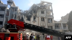 ისრაელის ავიდარტყმების შედეგად დანგრეული შენობა თეირანში. 2025 წლის 13 ივნისი