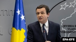 Kosovo Prime Minister Albin Kurti says a tariff on Serbian goods has been lifted, but Belgrade rejected the announcement.