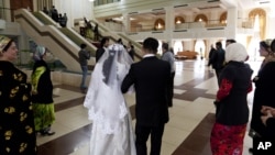 Newlyweds at a marriage registrar's office in Dushanbe
