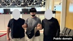 Мунарбек Сайпидинов Кыргызстанга алынып келген учурда тартылган сүрөт.