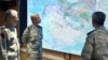 Iranian Army commander-in-chief Amir Hatami (center) attends a meeting in the military's War Command Room at an undisclosed location in Iran.