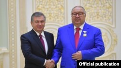 Ўзбекистон президенти Шавкат Мирзиëев ва Алишер Усмонов, август, 2018 йил