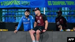 ټروټ له راشدخان سره