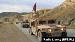 FILE: An Afghan army convoy in Badakhshan province.
