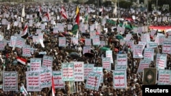 Protesters, predominantly supporters of the Houthis, rally to demonstrate solidarity with Palestinians, vowing that US airstrikes would not deter their support, in Sanaa, Yemen, April 25
