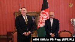 Afghan President Ashraf Ghani (right) met U.S. Secretary of State Mike Pompeo in Kabul on March 23.