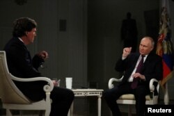 Карлсон і Путін