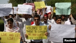 Students from Peshawar University protest to condemn the killing of Abdul Wali Khan university student Mashal Khan, after he was accused of blasphemy, during a protest in Peshawar on April 19.