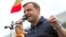 Andrei Nastase delivers a speech during a protest in front of the government building after his victory in the Chisinau mayoral runoff was invalidated, in Chisinau on July 1.