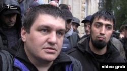 Ахра Авидзба и задержанный вместе с ним Талех Гасанов (архивная фотография)