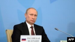 Президент России Владимир Путин на саммите ШОС. Бишкек, 13 сентября 2013 года.