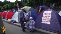 Moldovan Protesters Dig In