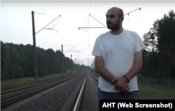 Павал Вабішчэвіч падчас следчага экспэрыменту. Скрыншот з фільма АНТ