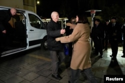 Belarusian opposition leader opposition leader Svyatlana Tsikhanouskaya welcomes Nobel laureate Ales Byalyatski in Vilnius after his release from a Belarus prison on December 13.