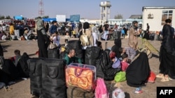 افغان کډوال د اسلام کلا له لارې افغانستان ته اوړي - انځور جون ۲۷ کال ۲۰۲۵ز