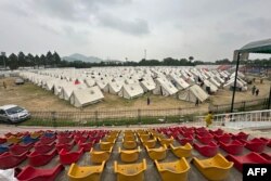 ضلعي انتظامیه وايي د خار په لوبغالي کې یې د کډوالو لپاره کیمپ جوړ کړی دی - د اګست ۱۳مې انځور.