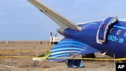 The wreckage of an Azerbaijan Airlines Embraer 190 lies on the ground near the airport of Aqtau, Kazakhstan, on December 26.