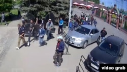 Мушташ тартылган видеодон кесилген сүрөт