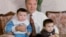 KAZAKHSTAN -- Kazakh President Nursultan Nazarbayev with his grandchildren - Aysultan (Left) and Altay. 1992