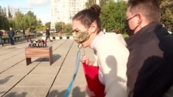 Protester Confronts Ukraine's President Outside Polling Station