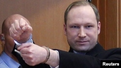 Anders Behring Breivik, who reportedly confessed to the rampage that killed 77 people, arrives at a court hearing in Oslo in February 2012.