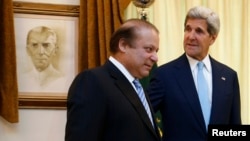 Pakistani Prime Minister Nawaz Sharif (left) meets with U.S. Secretary of State John Kerry in Islamabad on August 1.