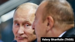 Володимир Путін (зліва) та Ільгам Алієв у Баку. Вересень 2018 року