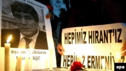 A makeshift memorial to journalist Hrant Dink at the site of his muder in Istanbul in January 2007