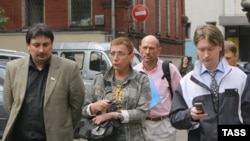 Yevgenia Debryanskaya (center) with fellow gay-rights activists Edvard Murzin _left) and Nikolai Alekseyev: "There was a time when we thought we could disband the army, ban the security services, open the borders, and legalize same-sex marriage."