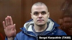 Russian protester Sergei Surovtsev, 30, was sentenced to 2 1/2 years in a penal colony for assaulting an officer during an anti-government rally in Moscow on July 27, 2019.