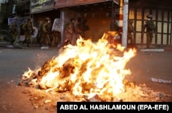 Під час сутичок силовиків із палестинськими демонстрантами в Хевроні на Західному березі Йордану, 11 травня 2021 року