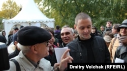 The foreign funding is at the heart of allegations leveled against Russian opposition leader Sergei Udaltsov (right).