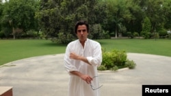 Makhdum Khusro Bakhtyar, a Pakistani landowner and politician poses for a picture after an interview with Reuters at his home in Mianwali Qureshian, a village in southern Punjab.