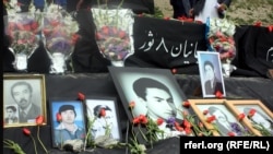 FILE: A protest demonstration to demand justice for the victims of war crimes in Afghanistan.
