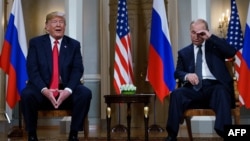 Фото от 16 июля 2018 года. Президент США Дональд Трамп и глава России Владимир Путин на встрече в Хельсинки, Финляндия