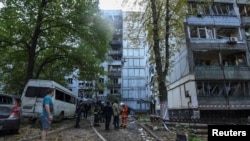 Urmările unui atac rusesc cu racheta asupra orașului ucrainean Dnipro.