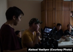 Director Stepan Burnashev reviewing footage during filming for his latest movie, Bihigi Kyhymmyt (Our Winter), in Yakutsk. “People across the globe now watch Korean cinema. Why can’t they watch Yakut films, too?” he says.