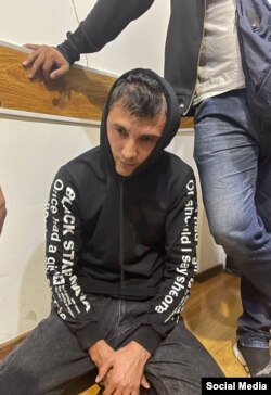 Фото Бобура Ганиева, распространенное в соцсетях сотрудником милиции.